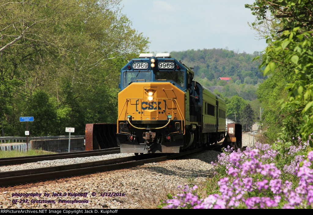 CSX 9969, GP40WH-2, with W004, eastbound on #2 track. Is crossing Sewickley Creek on the CSX Pittsburgh sub at BF-297 Gratztown, Pennsylvania. May 12, 2016.